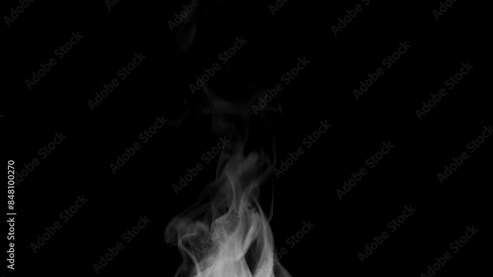 Trickle of Steam Slowly Rising from the Cup. White steam rises light, graceful twists on a black background. Slow motion. Footage is perfect for the layer with different blending modes. Trickle of Steam Slowly Rising from the Cup. White steam rises light, graceful twists on a black background. Slow motion. Footage is perfect for the layer with different blending modes.