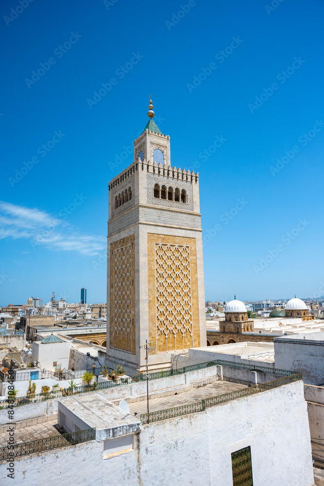 Fototapeta premium Zitouna Mosque,Located in the heart of Tunis' medina, this important mosque was founded in 734 and built on a site once occupied by a church. It was totally rebuilt in the 9th century and restored 