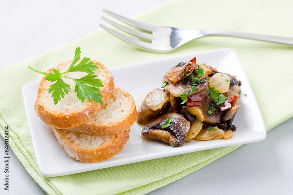 Garlic mushrooms with chilli. Traditional Spanish dish... Garlic mushrooms with chilli. Traditional Spanish dish...