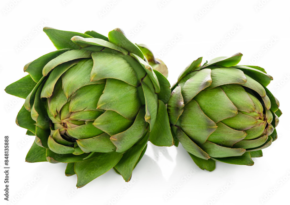 Fototapeta premium two green artichokes on a white background 1