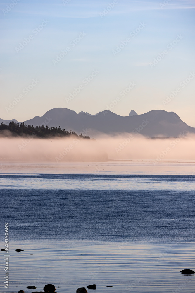 Clouds over the sea at dawn in British Columbia Clouds over the sea at dawn in British Columbia