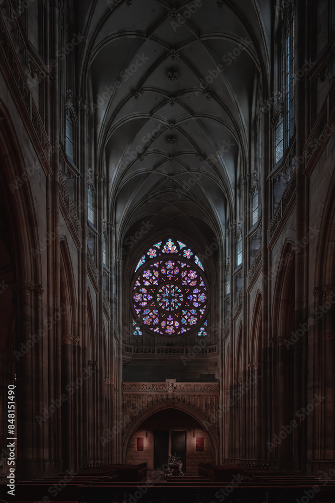 Gothic cathedral interior with stained glass window Gothic cathedral interior with stained glass window