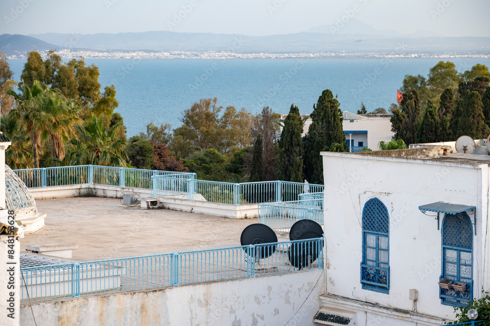 Fototapeta premium White-blue city of Sidi Bou Said, Tunisia. Eastern fairy tale with a French charm. View of an old historic building, Sidi Bou Said Carthage, Tunisia.