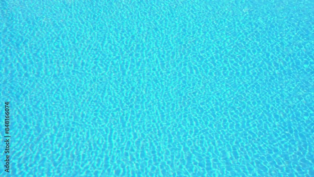 clear transparent light blue ripples of water pool, fresh dive color abstract natural background clear transparent light blue ripples of water pool, fresh dive color abstract natural background