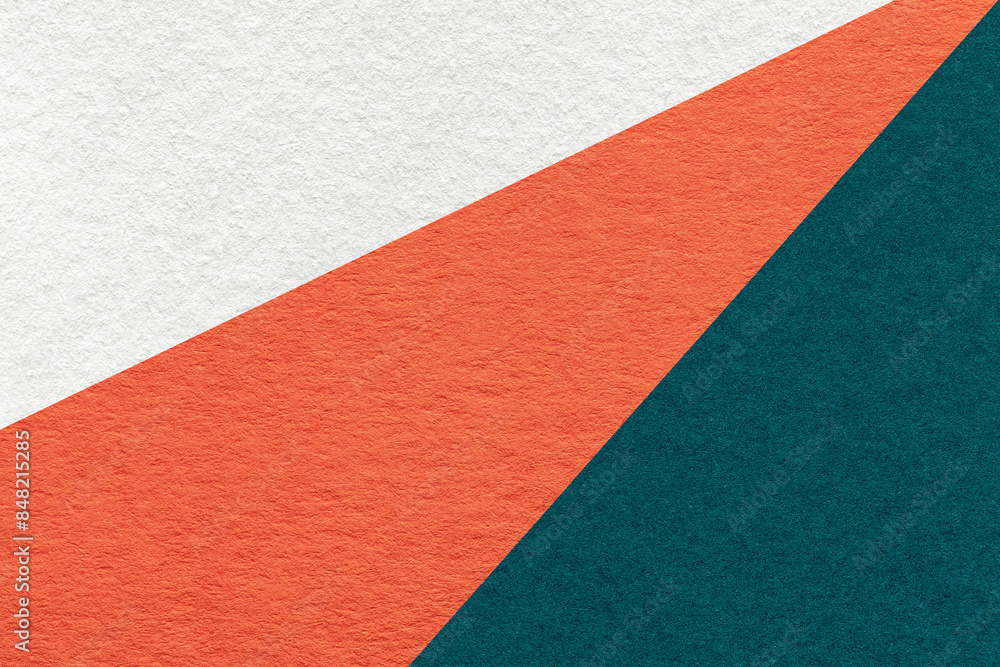 Texture of old craft white, orange and emerald color paper background, macro. Vintage abstract cardboard Texture of old craft white, orange and emerald color paper background, macro. Vintage abstract cardboard