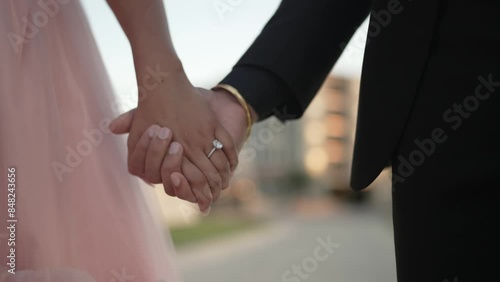 Couple standing together. Woman dressed in traditional Indian clothes, hindu wedding. Close up