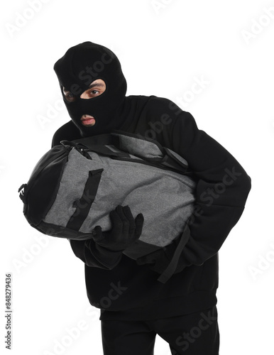 Thief in balaclava with bag on white background