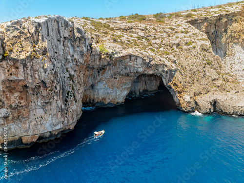 The famous arch and cave in Malta. The name is blue grotto.