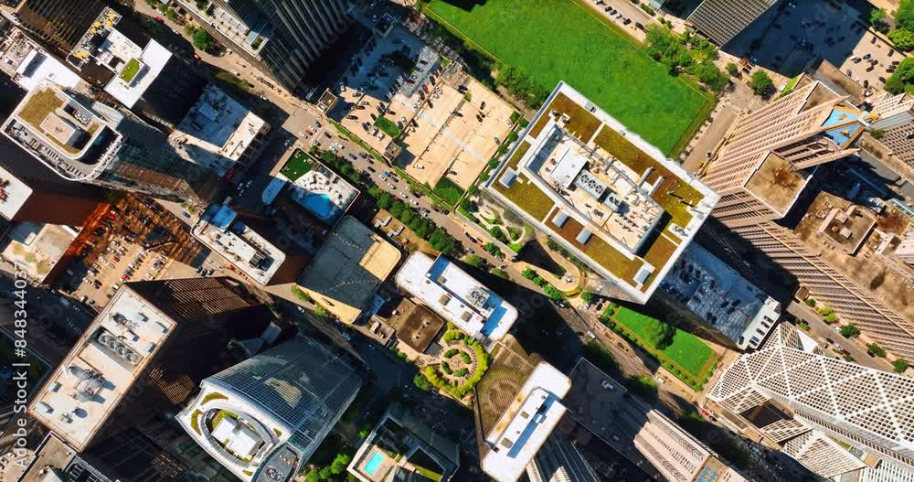 Bird's eye perspective on the modern metropolis. Grass lawns, gardens and car parks on tops of the buildings in Chicago, Illinois, US. Bird's eye perspective on the modern metropolis. Grass lawns, gardens and car parks on tops of the buildings in Chicago, Illinois, US.