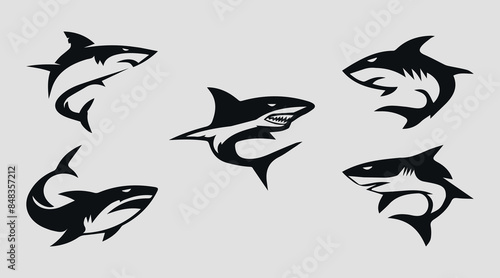Black shark icons. Set. Vector on gray background.  Art & Illustration