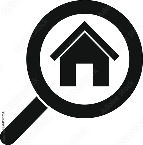 Black and white icon of a magnifying glass focusing on a house, representing the concept of real estate search