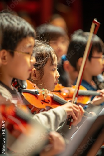 Young Students Immersed in a Live Music Concert Field Trip Learning About Different Instruments