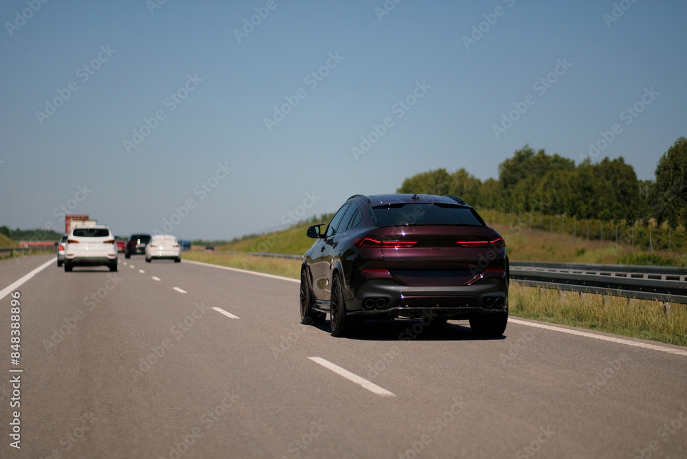SUV Luxury Sport Utility Off Road Vehicle Driving On Highway SUV Luxury Sport Utility Off Road Vehicle Driving On Highway