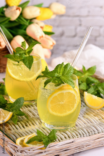 The Limoncello Spritz is a light, refreshing, cool cocktail made with lemon liqueur, prosecco and sparkling water, mint and a slice of lemon. © Maryna Voronova