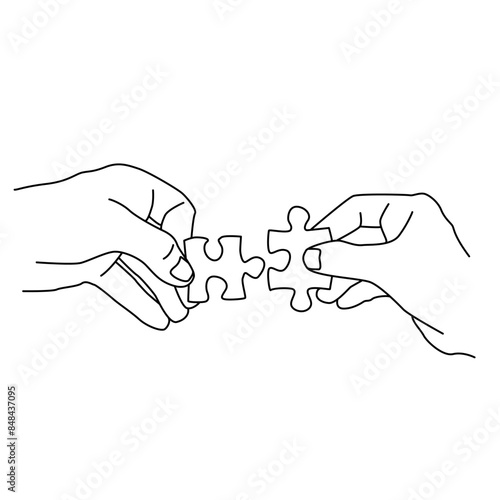 people picking up pieces of the puzzle