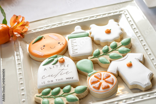 Obraz na plátně Plate of decorated cookies for a baby shower