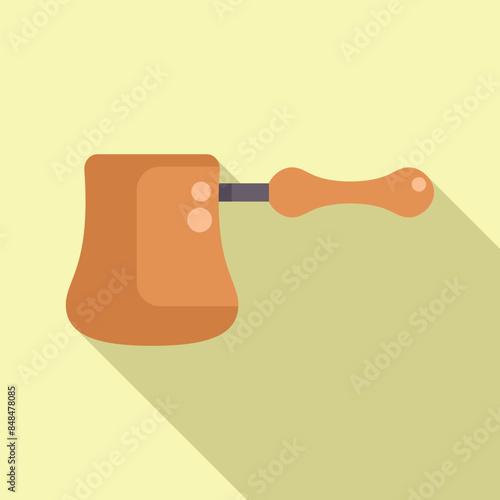 Copper cezve with long handle standing on yellow background with shadow