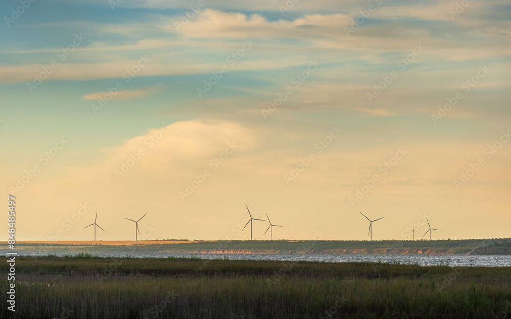 view to blue sky after sunset with wind turbines view to blue sky after sunset with wind turbines