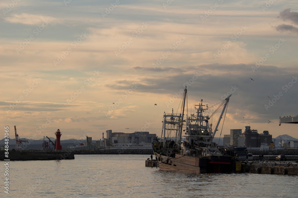 Fototapeta premium Kushiro Port at dusk with fishing vessels anchored