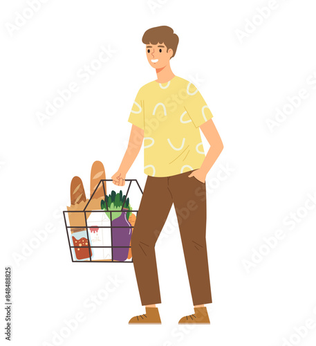 Young smiling man standing and holding supermarket basket full with food stuffs. Concept of supermarket shopping, daily life, lifestyle, grocery, customer. Flat vector illustration character.