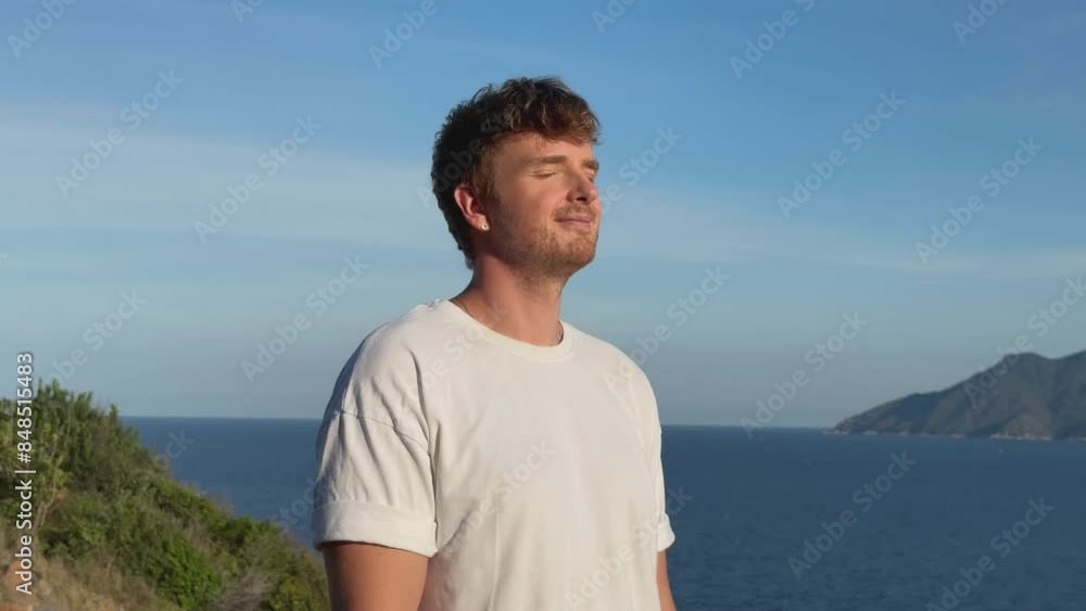 Happy young man enjoy freedom at summer vacation on sea, beach Happy young man enjoy freedom at summer vacation on sea, beach