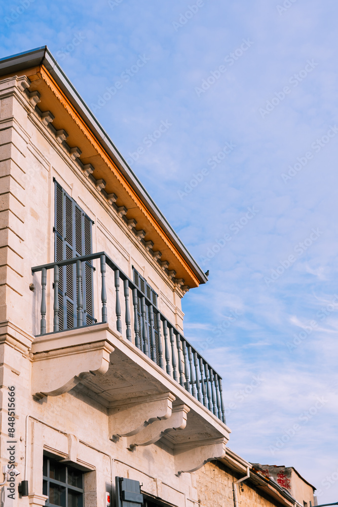 Cute and bohemian blue old balcony facade,wood windows in Nicosia Cute and bohemian blue old balcony facade,wood windows in Nicosia