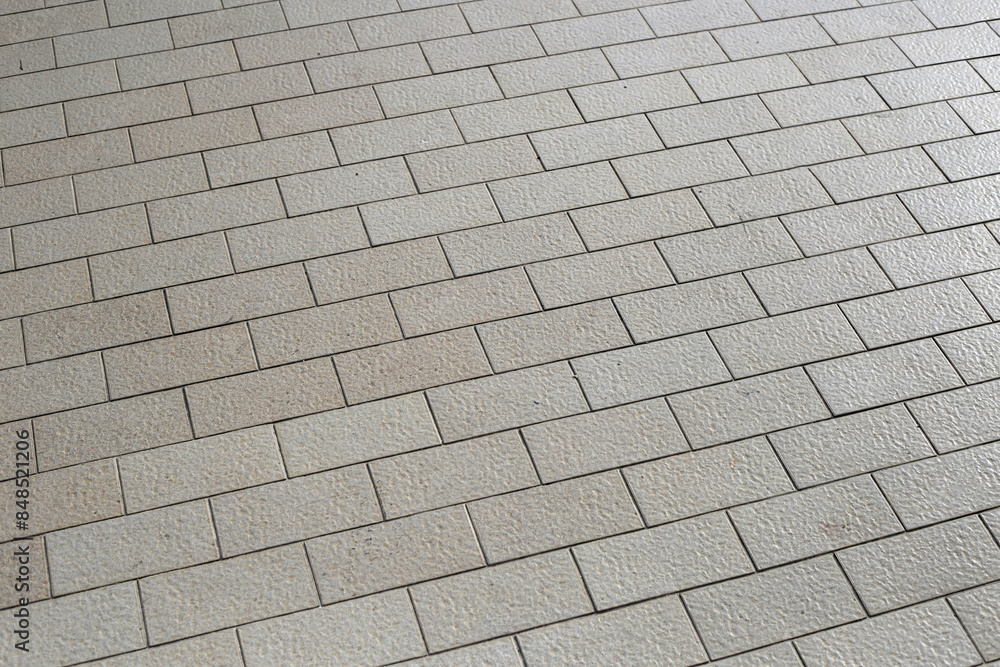 Brown tile floor walkway.Tiled courtyard Brown tile floor walkway.Tiled courtyard