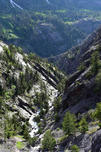 Scenic view of Bear Creek carving its path through the Rocky Mountains as seen from Mineral Creek Trail in Colorado photo