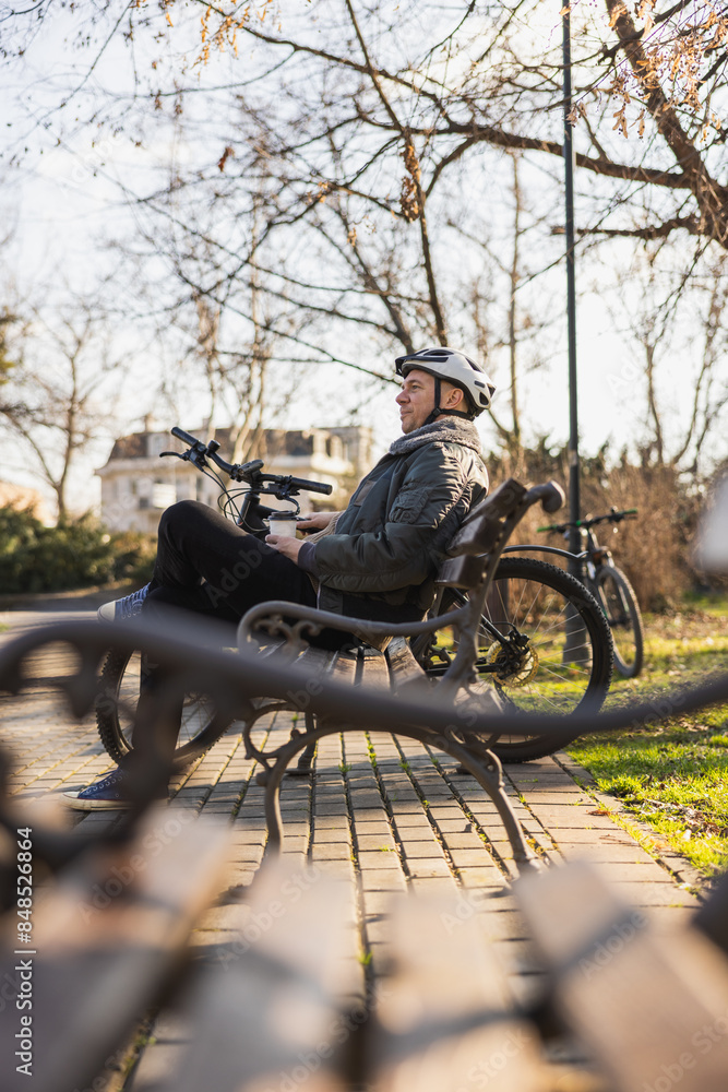 Man Enjoying Break on Park Bench Man Enjoying Break on Park Bench