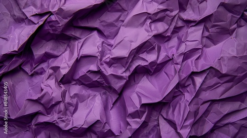Full frame image of a crumpled purple paper providing a unique texture and pattern suitable for backgrounds or graphic elements