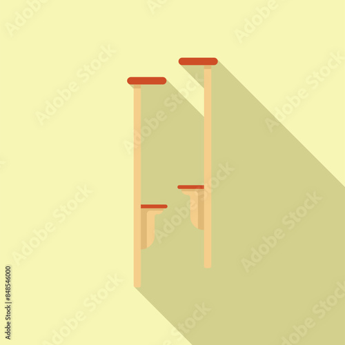 Two wooden stilts are standing upright, ready for someone to use them for fun and entertainment