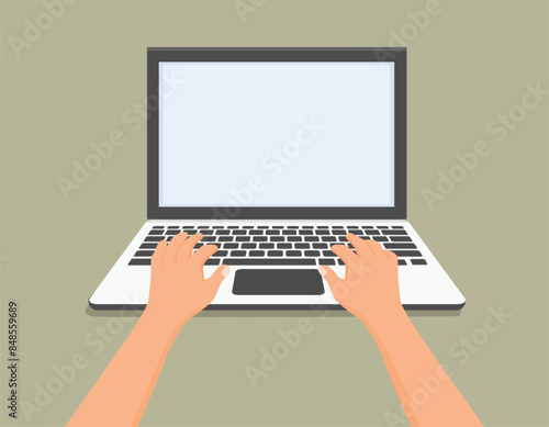 Hand using laptop typing on keyboard
