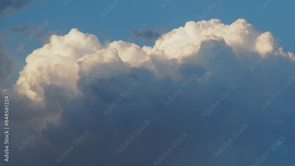Beautiful yellow clouds in sky. Volumetric light effect. Sunrays are hidden behind approaching dark clouds. Cumulus convection in troposphere. Cumulonimbus vertical developed. Sunset and sunrays Beautiful yellow clouds in sky. Volumetric light effect. Sunrays are hidden behind approaching dark clouds. Cumulus convection in troposphere. Cumulonimbus vertical developed. Sunset and sunrays