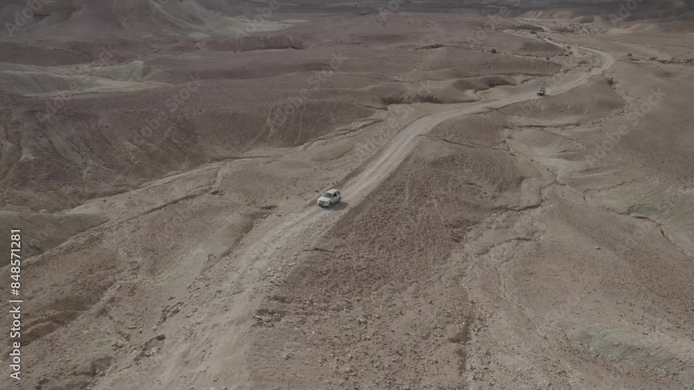 Aerial video above 4x4 jeeps on a trip in a desert area, in the south of Israel Aerial video above 4x4 jeeps on a trip in a desert area, in the south of Israel