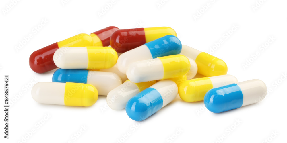 Many antibiotic pills isolated on white. Medicinal treatment Many antibiotic pills isolated on white. Medicinal treatment