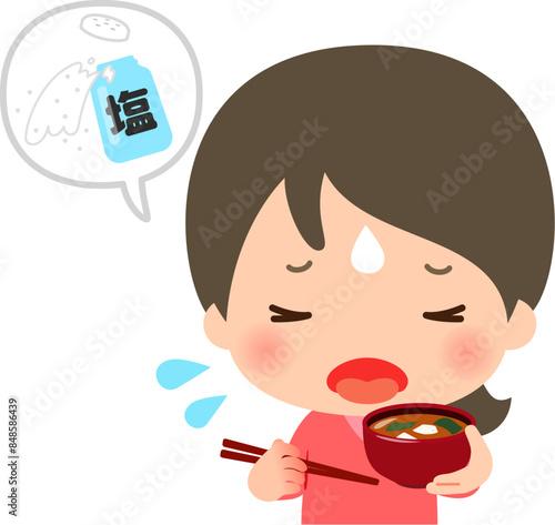しょっぱい味噌汁を食べた女性