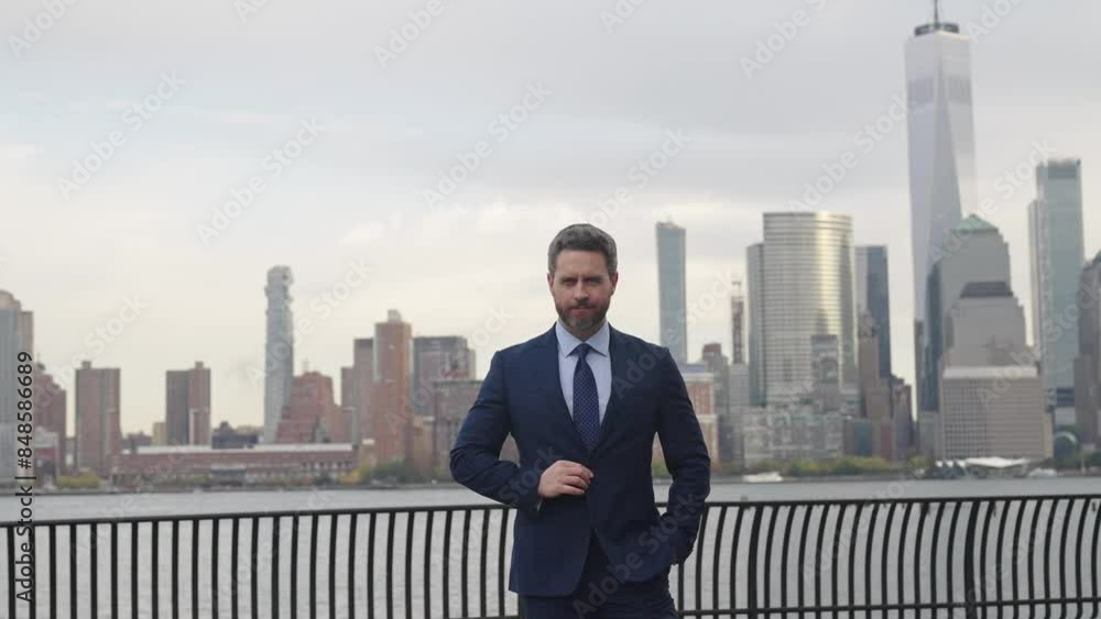 Success of CEO. Business success advertisement. Successful businessman posing outdoor. Businessman in suit in Manhattan. Business boss man posing for photo advertisement. Successful business Success of CEO. Business success advertisement. Successful businessman posing outdoor. Businessman in suit in Manhattan. Business boss man posing for photo advertisement. Successful business