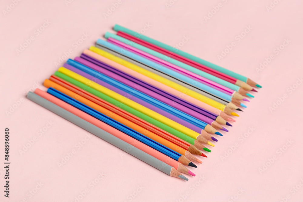 Color pencils on pink background Color pencils on pink background