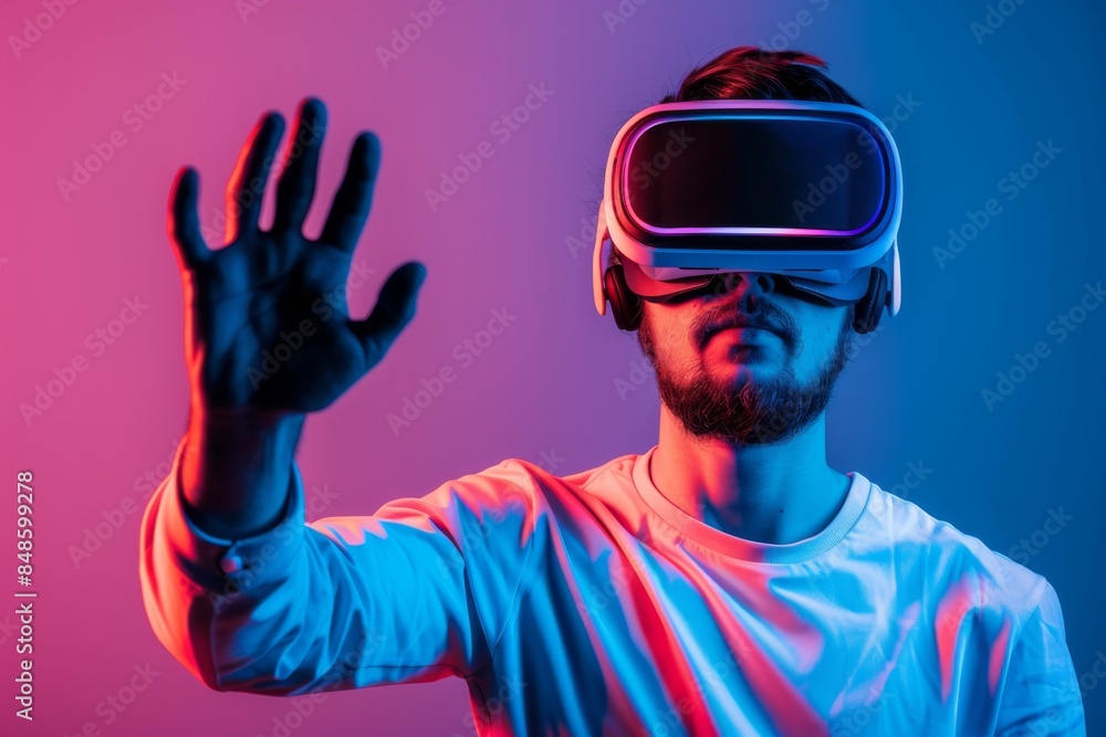 man in vr glasses, playing video games with virtual reality headset, trying to touch something with hand man in vr glasses, playing video games with virtual reality headset, trying to touch something with hand