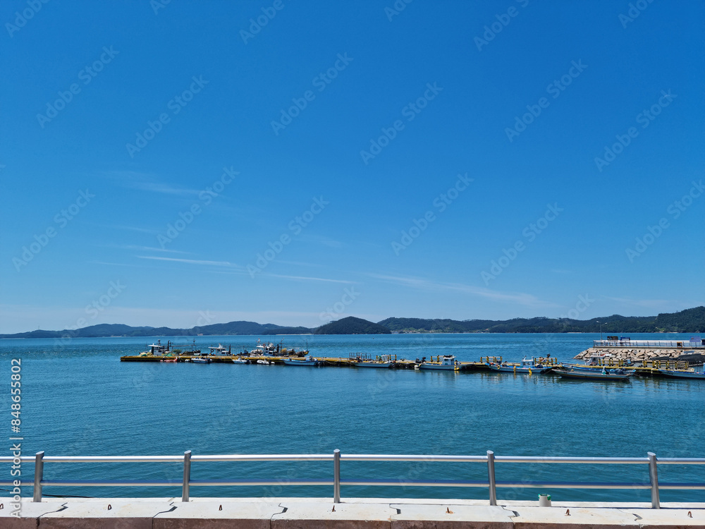 This is the sea where fishing boats are anchored.