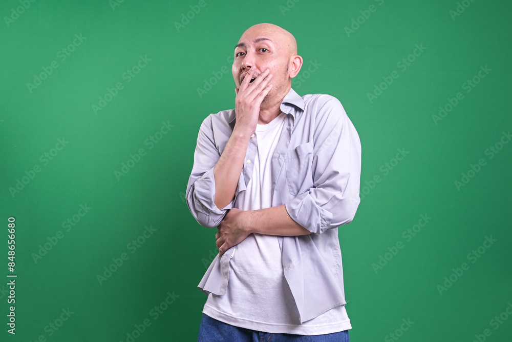 Adult Bald Man In Casual Shirt Covering Mouth With Hands Feels Surprised Adult Bald Man In Casual Shirt Covering Mouth With Hands Feels Surprised