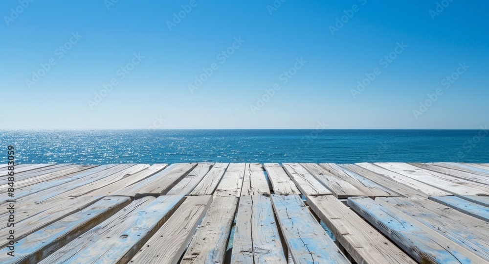 Empty old wooden surface or table on a blurred background of the Ocean. An empty wooden pier on the background of a seascape. Mock-up of a showcase for demonstrating products tourism. Copy space Empty old wooden surface or table on a blurred background of the Ocean. An empty wooden pier on the background of a seascape. Mock-up of a showcase for demonstrating products tourism. Copy space