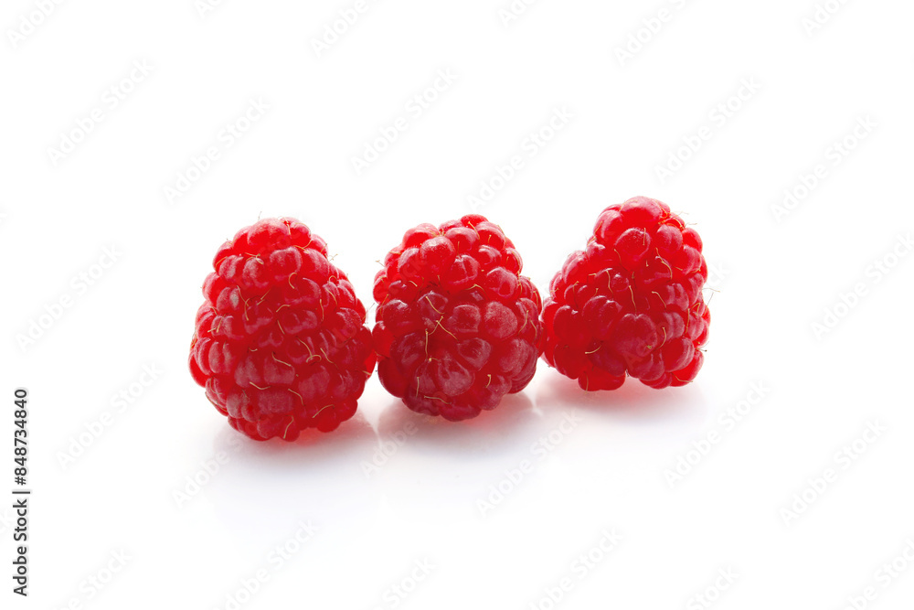 ripe red raspberries isolated on a white background ripe red raspberries isolated on a white background