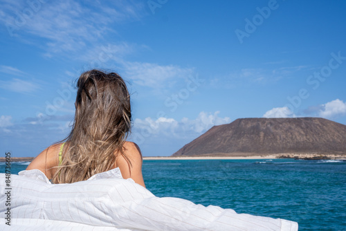 Woman Gazes at Volcanic Landscape in the Canary Islands