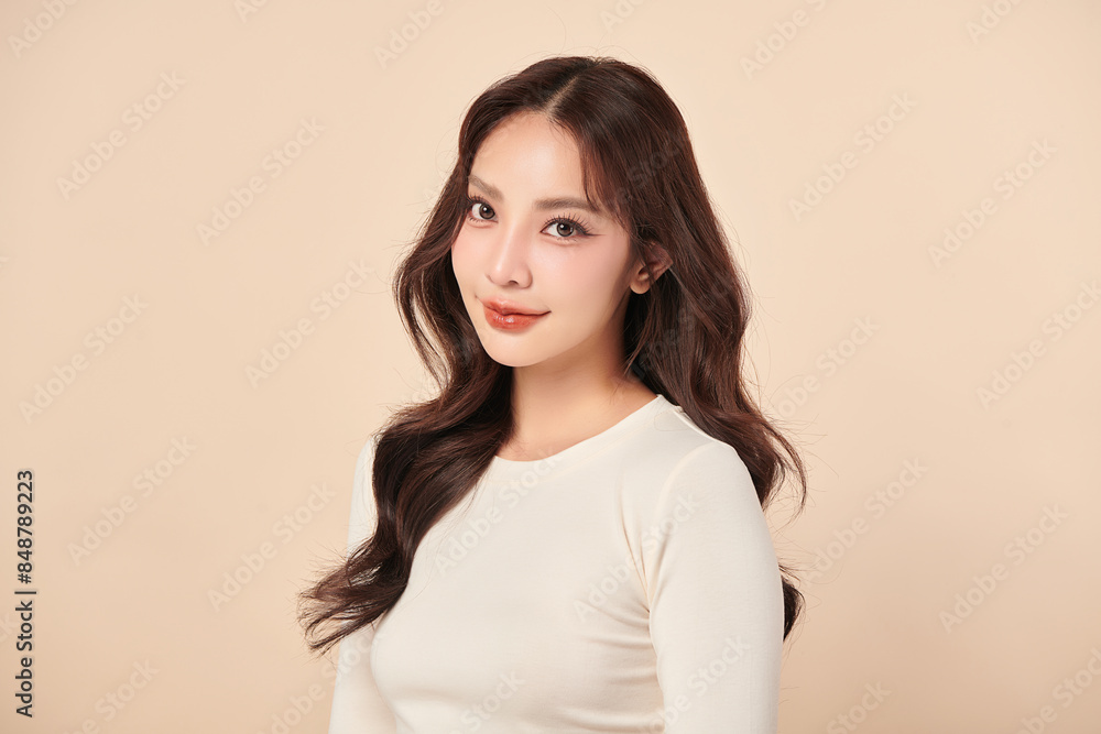 Beautiful young asian woman with clean fresh skin on beige background, Face care, Facial treatment, Cosmetology, beauty and spa, Asian women portrait. Beautiful young asian woman with clean fresh skin on beige background, Face care, Facial treatment, Cosmetology, beauty and spa, Asian women portrait.