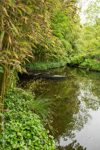 Water garden setting at Famous Artist's Home in Giverny France with Boat