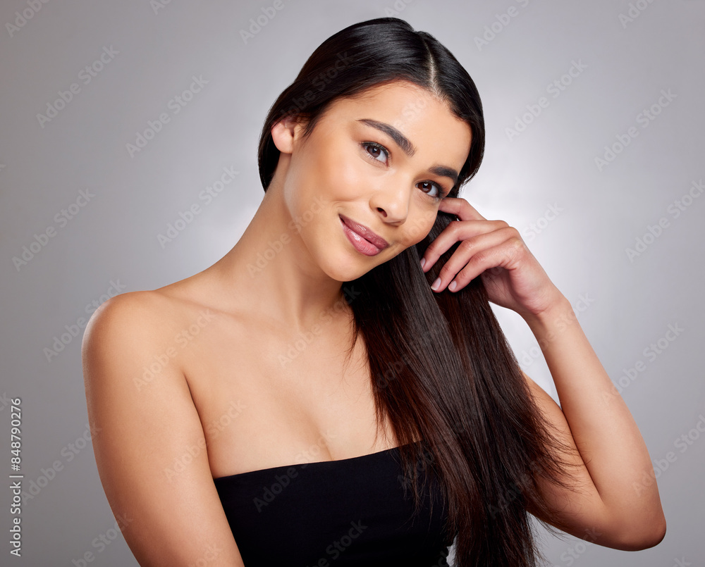 Happy, woman and portrait in studio for hair care or routine, hairstyle and scalp treatment. Girl, isolated and grey background with healthy growth, natural cosmetic and keratin glow with beauty. Happy, woman and portrait in studio for hair care or routine, hairstyle and scalp treatment. Girl, isolated and grey background with healthy growth, natural cosmetic and keratin glow with beauty.