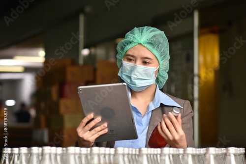 QC Quality Control manager Inspect products to guarantee quality before sending out to the consumer market. photo