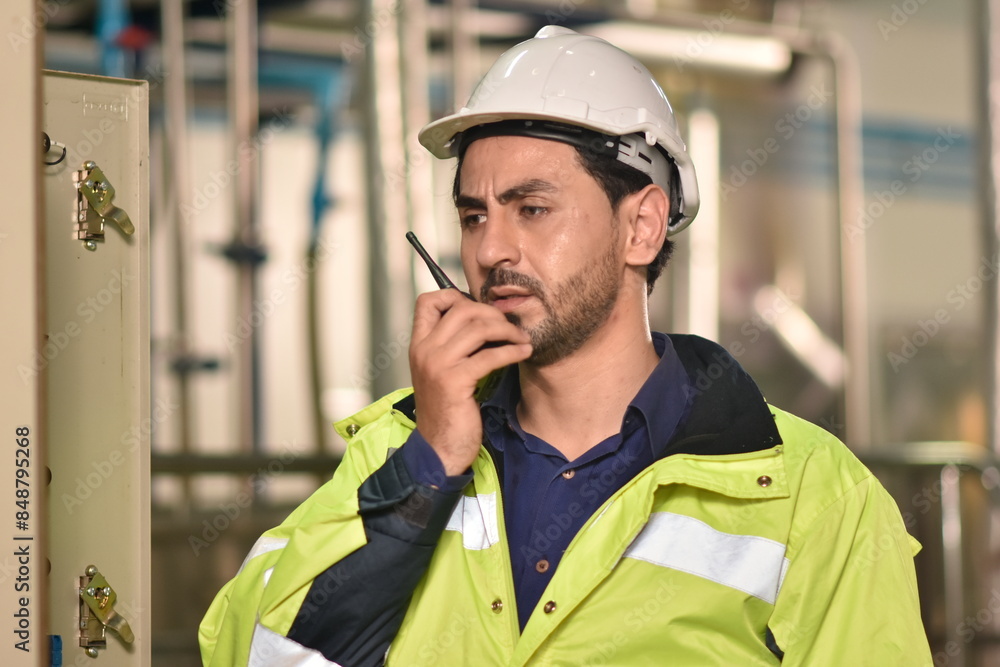 Manager inspecting in product factory. Engineer checking machine in factory. Worker in factory. Manager inspecting in product factory. Engineer checking machine in factory. Worker in factory.