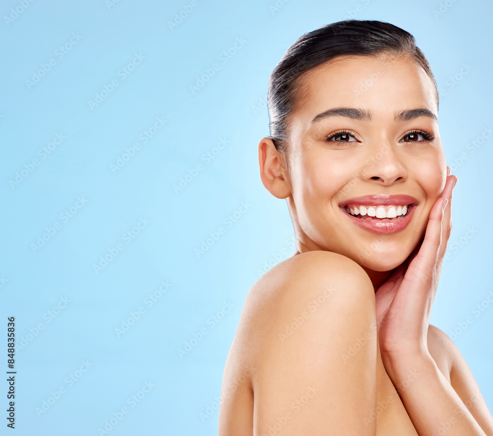 Happy, woman and portrait in studio for skincare or health, dermatology and skin treatment for self care. Girl, mock up and isolated on blue background with natural cosmetics, glow and beauty shine. Happy, woman and portrait in studio for skincare or health, dermatology and skin treatment for self care. Girl, mock up and isolated on blue background with natural cosmetics, glow and beauty shine.